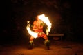 Fire show in famous Hina cave, blurred motion, Oholei beach, Ton