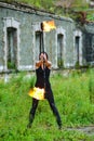 Fire show girl with flaming torches Royalty Free Stock Photo