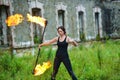 Fire show girl with flaming torches Royalty Free Stock Photo