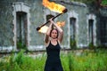 Fire show girl with flaming torches Royalty Free Stock Photo