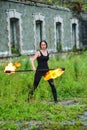 Fire show girl with flaming torches Royalty Free Stock Photo