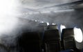 Fire and smoke in the aircraft cabin Royalty Free Stock Photo