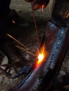 Fire sparkle generates due to welding work Royalty Free Stock Photo