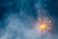 fire sparkler in dense fog, abstract Christmas firework background Royalty Free Stock Photo