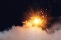 fire sparkler in dense smoke, abstract Christmas firework background Royalty Free Stock Photo