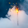 Fire sparkler in dense smoke, abstract Christmas firework background Royalty Free Stock Photo