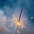 Fire sparkler in dense smoke, abstract Christmas firework background Royalty Free Stock Photo