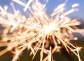 fire sparkles to celebrate the 4th of July on a natural background Royalty Free Stock Photo