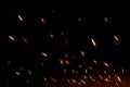 Fire sparks on black background Royalty Free Stock Photo