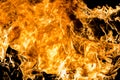 Fire and sparks, from a campfire on a dark night background, front and background blurred Royalty Free Stock Photo