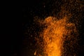 Fire and sparks, from a campfire on a dark night background, front and background blurred Royalty Free Stock Photo