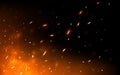 Fire sparks on dark backdrop. Glowing particles flying up. Realistic fire and flame. Yellow and red light effect Royalty Free Stock Photo