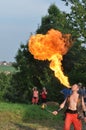 Fire spitting juggler