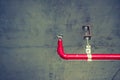 Fire sprinkler and red pipe ( Filtered image processed vintage Royalty Free Stock Photo