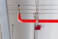 Fire sprinkler and red pipe installed on ceiling for safety concept Royalty Free Stock Photo