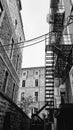 Fire stairs in the back of stone house buildings in the old town of Quebec City, Canada Royalty Free Stock Photo