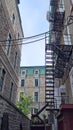 Fire stairs in the back of stone house buildings in the old town of Quebec City, Canada Royalty Free Stock Photo