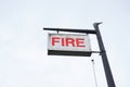 Fire station sign in sky blank post single isolated red white Royalty Free Stock Photo