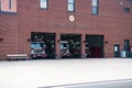 Fire station in a small town Berlin in Maryland USA. Three fire trucks are in the open garage