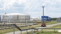 Fire truck in industrial plant. A large red fire rescue vehicle in the chemistry refinary plant. Fire safety concept