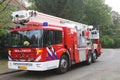 Fire truck is stand-by during a storm, Netherlands