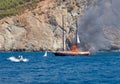 Fire on Turkish yacht in the Mediterranean Sea. The boat came to the rescue. Oludeniz,Fethiye,Mugla,Turkey