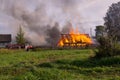 A fire in the village. Burning wooden houses in the village of Rantsevo, Tver region. Royalty Free Stock Photo