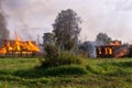 A fire in the village. Burning wooden houses in the village of Rantsevo, Tver region. Royalty Free Stock Photo
