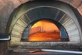 Fire wood burning in oven, Fire stone stove oven for italian pizza restaurant kitchen Royalty Free Stock Photo
