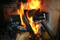 Fire with wood in a cast iron stove Royalty Free Stock Photo