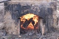 Fire of wood fire kiln is part of process for black pottery