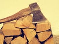 Fire wood with an old axe Royalty Free Stock Photo