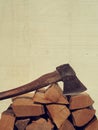 Fire wood with an old axe Royalty Free Stock Photo