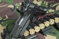 Firearm Pistol on military camouflage background