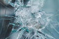 Firearms bullethole on bulletproof glass, cracks background Royalty Free Stock Photo