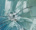 Firearms bullethole on the glass from the bullets, cracks background Royalty Free Stock Photo