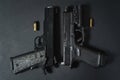 Firearms, modern tactical 9mm pistol and classic 45 caliber pistol