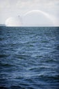 Fireboat in action on the sea