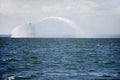 Fireboat in action on the sea