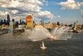 Fireboat display in New York City Hudson River viewed from departing cruise ship