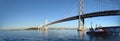 Fireboat docked in front of the San Francisco-Oakland Bay Bridge