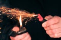 Firecracker Burning in Hand with Sparks and Smoke Royalty Free Stock Photo