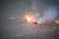 Firecracker exploding in the street Royalty Free Stock Photo