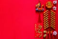 Firecrackers for Chinese new year with gold ingots, red envelope packet and pendant dragon Royalty Free Stock Photo