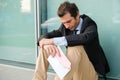 Fired businessman reading the notice of job termination Royalty Free Stock Photo