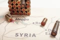 The fired cases and bullets from rifle. Background view on section area of Aleppo, Syria.