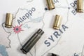 The fired cases and bullets from rifle. Background view on section area of Aleppo, Syria.