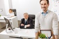 Fired positive employee carrying the box and quitting the job Royalty Free Stock Photo