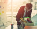 Fired Unemployed Business man worker packing up a box with upset expression for unemployment concept, economic recession concept Royalty Free Stock Photo