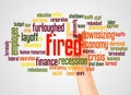 Fired word cloud and hand with marker concept Royalty Free Stock Photo